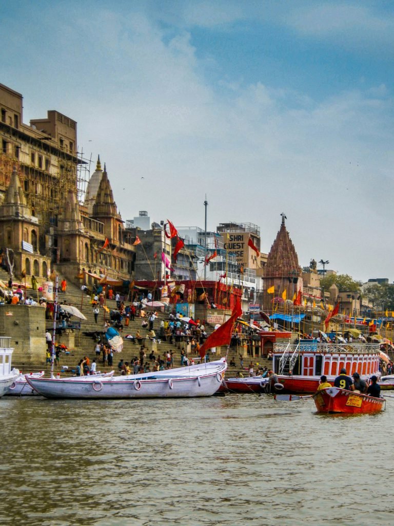 Boats on the Ganges facing the historic ghats and temples of Banaras