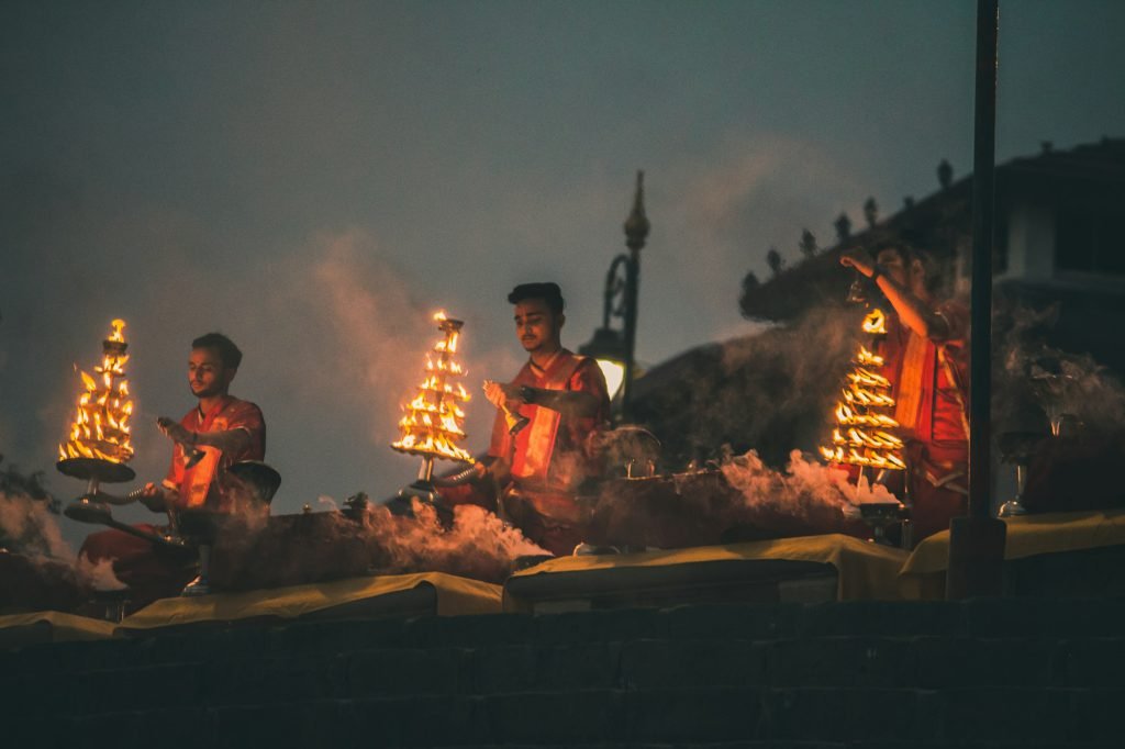 Priests performing the evening Ganga Aarti ceremony in Banaras